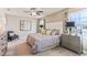 Spacious bedroom with large windows and plush bedding at 10559 Dusty Boot Rd, Land O Lakes, FL 34638