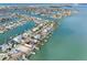 Aerial view of waterfront home and neighborhood at 11325 9Th E St, Treasure Island, FL 33706