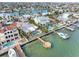 Aerial view of waterfront home with private dock at 11325 9Th E St, Treasure Island, FL 33706