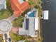 Bird's-eye view showcasing home, pool, and waterfront location at 1300 51St Ne Ave, St Petersburg, FL 33703