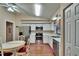 Cozy kitchen features stainless steel appliances and white cabinetry at 13108 Dobree Pl, Riverview, FL 33579