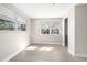 Bright bedroom featuring hardwood floors and large windows at 1349 Woodbine St, Clearwater, FL 33755