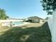 Large backyard with above ground pool, patio, and shed at 1447 Coble Rd, Spring Hill, FL 34608