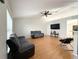 Living Room with hardwood floors and two reclining sofas at 1447 Coble Rd, Spring Hill, FL 34608