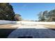 Round above-ground pool with surrounding patio at 1447 Coble Rd, Spring Hill, FL 34608