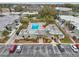 Arial view showing community pool and surrounding buildings at 1799 N Highland Ave # 136, Clearwater, FL 33755