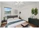 Comfortable bedroom with hardwood floors and ample closet space at 1799 N Highland Ave # 136, Clearwater, FL 33755