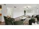 Bright living room with hardwood floors and stylish furniture at 1799 N Highland Ave # 136, Clearwater, FL 33755