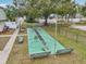 Community shuffleboard court with benches at 1799 N Highland Ave # 136, Clearwater, FL 33755