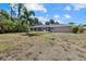 Spacious backyard with view of the house at 18292 Robinson Ave, Port Charlotte, FL 33948
