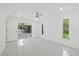 Spacious bedroom with large windows and sliding glass doors at 18292 Robinson Ave, Port Charlotte, FL 33948