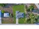 Bird's eye view of a single-Gathering home and surrounding neighborhood at 18400 Tulane Ave, Port Charlotte, FL 33954