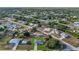Wide aerial view showcasing the neighborhood and surrounding area at 18400 Tulane Ave, Port Charlotte, FL 33954