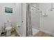 Clean bathroom with toilet and shower at 18400 Tulane Ave, Port Charlotte, FL 33954
