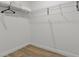 Large walk-in closet with wire shelving and hanging rods at 18400 Tulane Ave, Port Charlotte, FL 33954