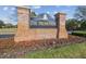 Brick community sign for The Promenade neighborhood at 18924 Duquesne Dr, Tampa, FL 33647