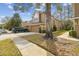 Two-story townhome with attached garage and landscaping at 18924 Duquesne Dr, Tampa, FL 33647