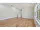 Light-filled living room showcasing hardwood floors at 18924 Duquesne Dr, Tampa, FL 33647