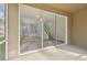 Screened porch with sliding glass doors to living room at 18924 Duquesne Dr, Tampa, FL 33647