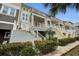 Beach townhome exterior, featuring multiple stories and balconies at 19915 Gulf Blvd # 605, Indian Shores, FL 33785