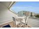 Relaxing private balcony with table and chairs plus a sofa at 19915 Gulf Blvd # 605, Indian Shores, FL 33785