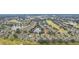 Aerial view of home and surrounding community at 2028 Acadia Greens Dr, Sun City Center, FL 33573