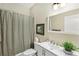 Updated bathroom with a shower/tub combo and a modern vanity at 2028 Acadia Greens Dr, Sun City Center, FL 33573