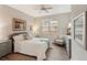 Spacious bedroom with a comfortable bed, window seating, and ample natural light at 2028 Acadia Greens Dr, Sun City Center, FL 33573