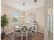 Charming dining area with a round table and neutral decor at 2028 Acadia Greens Dr, Sun City Center, FL 33573