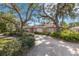 House exterior showcasing landscaping and curb appeal at 215 Snell Isle Ne Blvd, St Petersburg, FL 33704