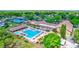 Community overview showing pool, clubhouse and tennis courts at 2320 Shelly Dr # B, Palm Harbor, FL 34684