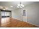 Dining room with wood floors and access to patio at 2320 Shelly Dr # B, Palm Harbor, FL 34684