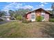 Brick home with a neatly landscaped front yard at 2320 Shelly Dr # B, Palm Harbor, FL 34684