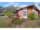 Brick home with a nicely landscaped front yard at 2320 Shelly Dr # B, Palm Harbor, FL 34684