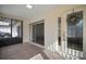 Bright front porch with tiled floor and access to living area at 2320 Shelly Dr # B, Palm Harbor, FL 34684