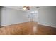 Living room with laminate wood floors and ceiling fan at 2320 Shelly Dr # B, Palm Harbor, FL 34684