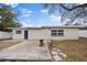 Backyard with wooden deck and fenced yard at 2400 Keene Park Dr, Largo, FL 33771