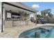 Modern outdoor kitchen with stainless steel appliances at 2765 Mcnair Dr, Palm Harbor, FL 34683