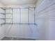 Walk-in closet with ample wire shelving at 2930 Swan Cir, Dunedin, FL 34698