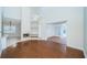 Large living room boasts a fireplace, custom built-ins, and access to the outdoor living space at 2930 Swan Cir, Dunedin, FL 34698
