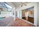Screened patio with brick pavers and sliding glass doors to seamlessly transition indoors at 2930 Swan Cir, Dunedin, FL 34698