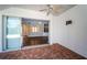 A large, screened patio with brick pavers and seamless transition to the house interior at 2930 Swan Cir, Dunedin, FL 34698