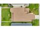 Top-down view of house showing roofline and yard at 29762 Chapel Chase Dr, Wesley Chapel, FL 33545