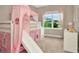 Fun bedroom with a bunk bed and slide at 29762 Chapel Chase Dr, Wesley Chapel, FL 33545