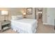 Bedroom with a queen bed, neutral decor, and access to hallway at 29762 Chapel Chase Dr, Wesley Chapel, FL 33545