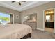 Main bedroom with ensuite bathroom access at 29762 Chapel Chase Dr, Wesley Chapel, FL 33545