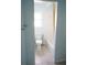 Clean bathroom with shower/tub combo and white tile at 317 Green Manor Dr # 38 B, Sun City Center, FL 33573