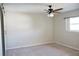 Spacious bedroom with ceiling fan and carpet flooring at 317 Green Manor Dr # 38 B, Sun City Center, FL 33573