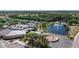 Community center with tennis courts and a pond at 317 Green Manor Dr # 38 B, Sun City Center, FL 33573