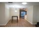 Dining room features a table and chandelier with view into kitchen at 317 Green Manor Dr # 38 B, Sun City Center, FL 33573